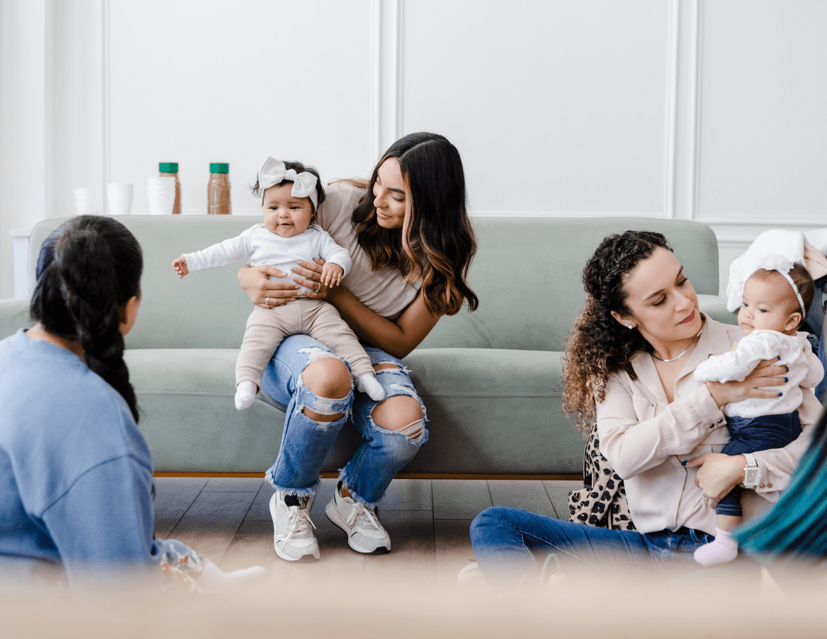 Mothers supporting each other in a warm, welcoming environment